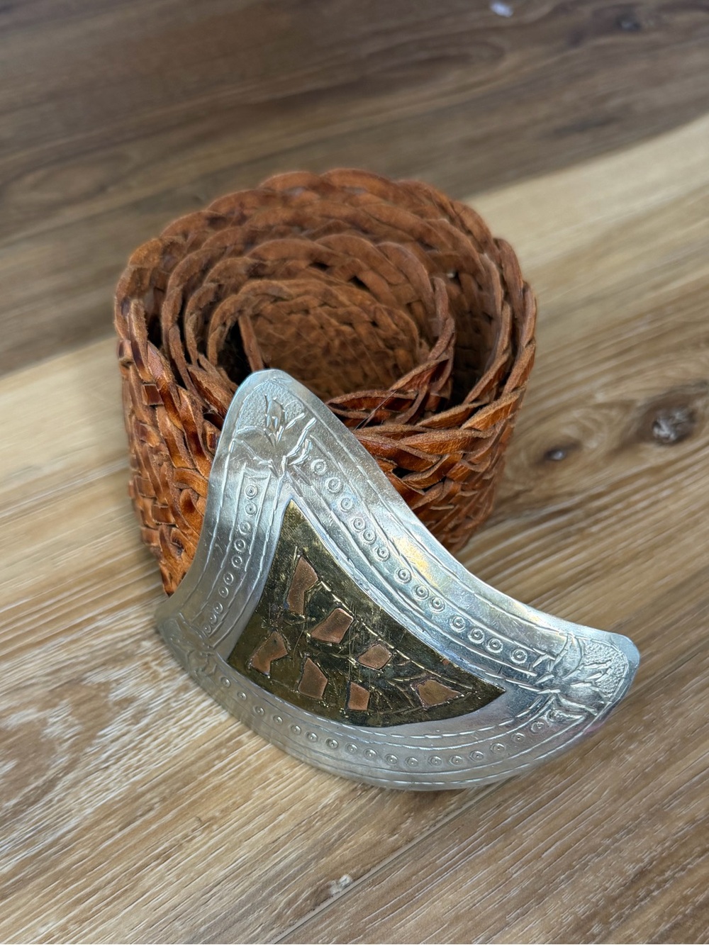 Handwoven Brown Leather Belt with Decorative Silver Buckle